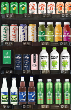 Assorted fresh food, drinks, and essentials in a micromarket cooler